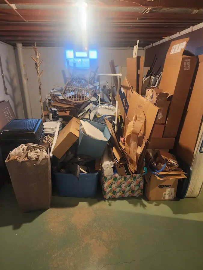 Roll-off dumpster container at job site for Roll Off Dumpster Rental in Pine Ridge